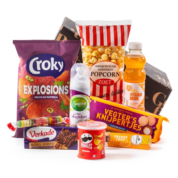 Leuk kerstpakket met verschillende etenswaren.
