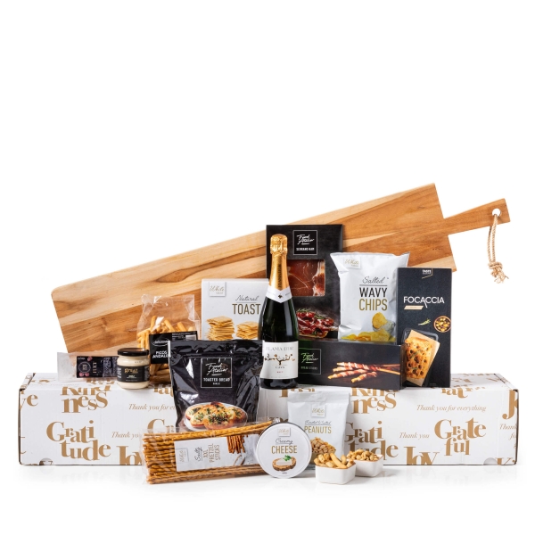 Snijplank kerstpakket om mee te borrelen.